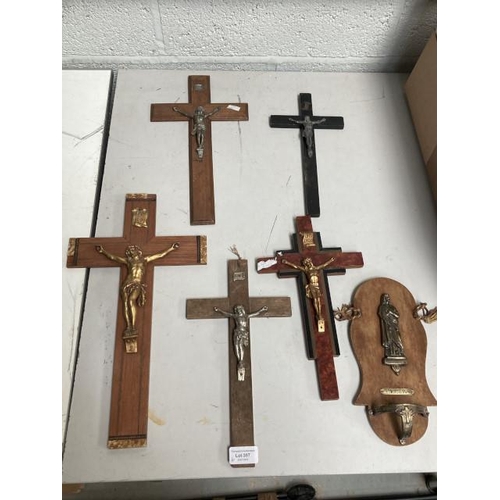 397 - 5 crucifixes and a Souvenir de Communion