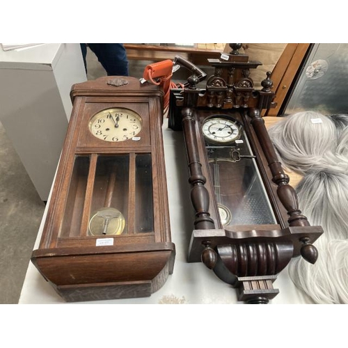 477 - Antique mahogany wall clock with pendulum and key and a 1930’s oak wall clock with pendulum and key