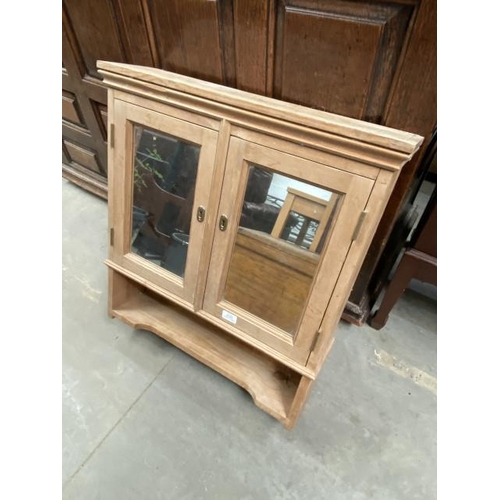 74 - Pine wall mounted 2 door cupboard 73H 62W 14D