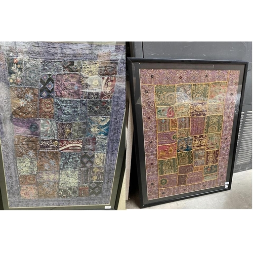 85 - 2 black framed Middle Eastern embroidered panels 73H 100W