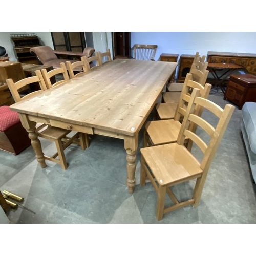 93 - Pine farmhouse country kitchen table 77H 245W 120D and 10 pine ladder back chairs