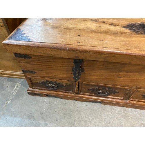 133 - Pine, iron bound trunk with 4 drawers 50H 149W 49D