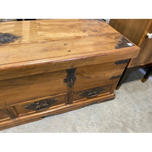 133 - Pine, iron bound trunk with 4 drawers 50H 149W 49D