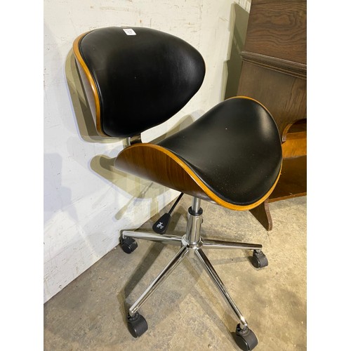 140 - Eames style walnut framed swivel office chair 53W