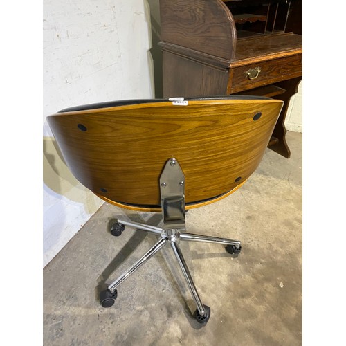 140 - Eames style walnut framed swivel office chair 53W