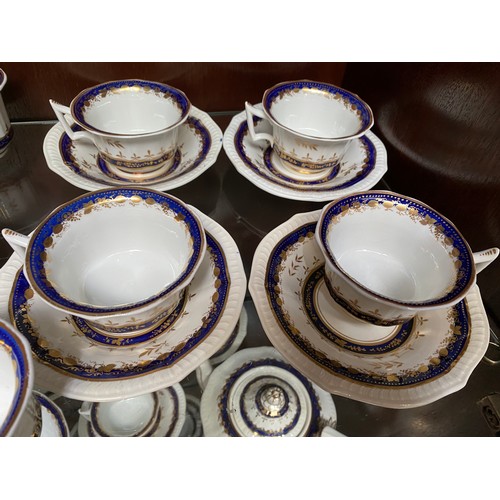 407 - 37 piece 18th/ 19th century porcelain tea service (Two cups with repair- as seen)