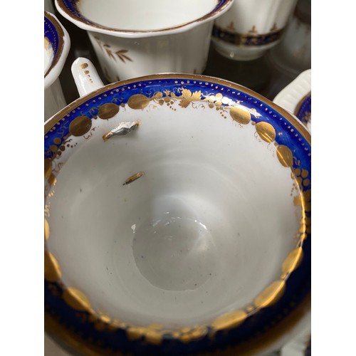 407 - 37 piece 18th/ 19th century porcelain tea service (Two cups with repair- as seen)