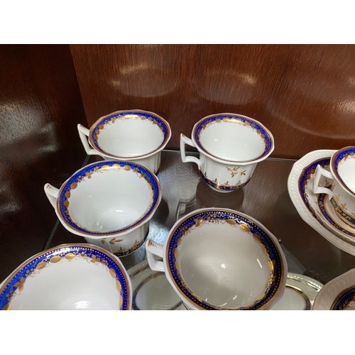 407 - 37 piece 18th/ 19th century porcelain tea service (Two cups with repair- as seen)