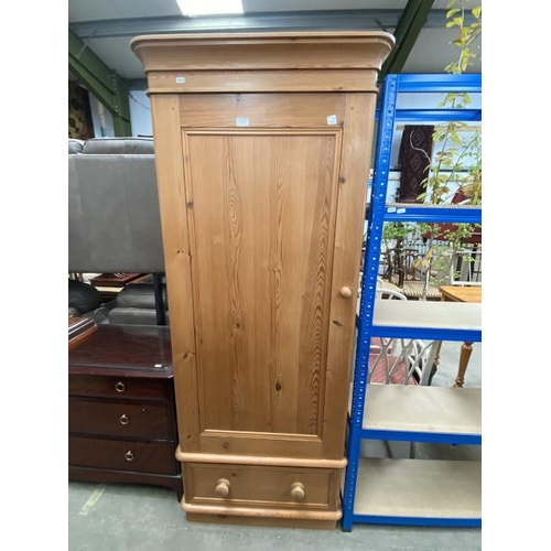 129 - Pine single door with one drawer wardrobe with hanging rail to the interior 187H 76W 59D