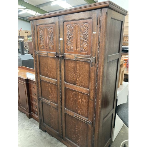 522 - Carved oak 2 door wardrobe 187H 124W 48D