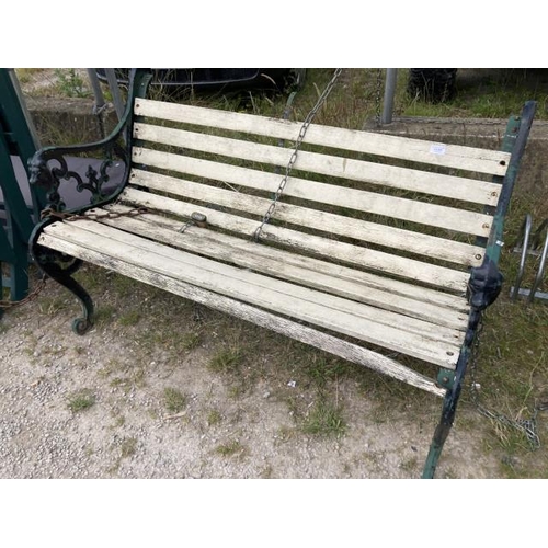 560 - Cast metal and wood garden bench 135W