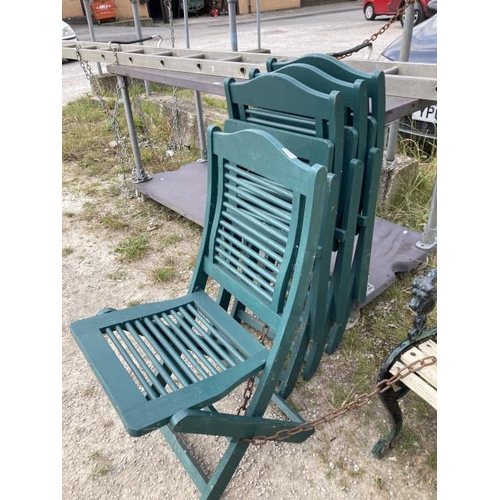 561 - 4 painted folding wooden garden chairs.