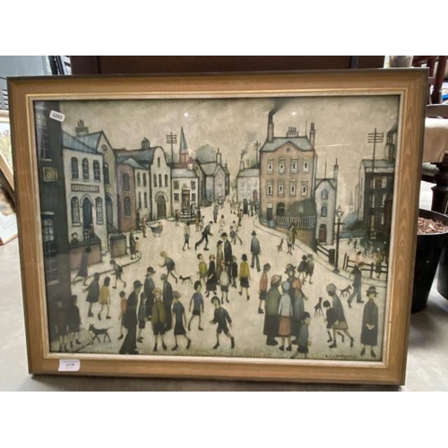 84 - L.S. Lowry framed print ‘A Village Square’ 67 x 53cm