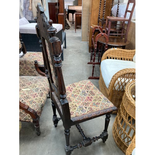 192 - 2x 17th century style carved oak hall chairs 47W and a carved mahogany reading chair 65W