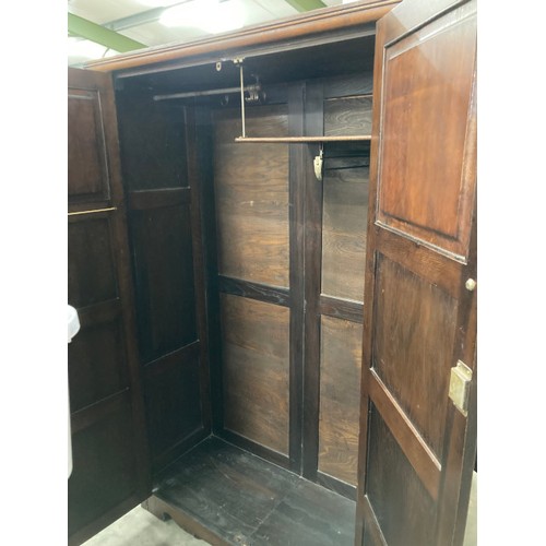 522 - Carved oak 2 door wardrobe 187H 124W 48D