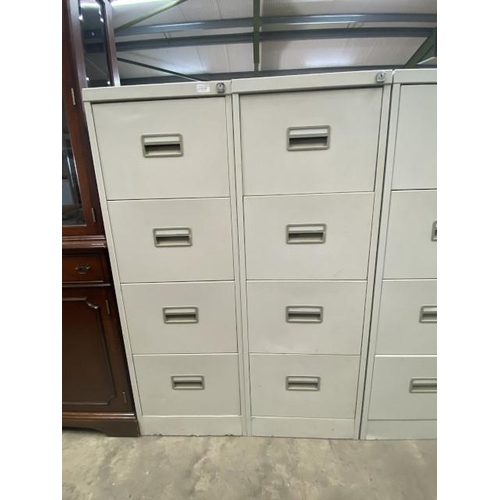 105 - 2 metal 4 drawer filing cabinets 132H 46W 62 (open but no keys)