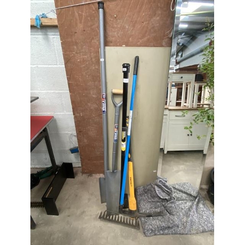 11 - 2 Spear & Jackson spades, Roughneck pick axe, Wickes professional contractors rammer etc