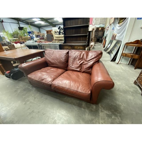 148 - Tan leather settee 180W