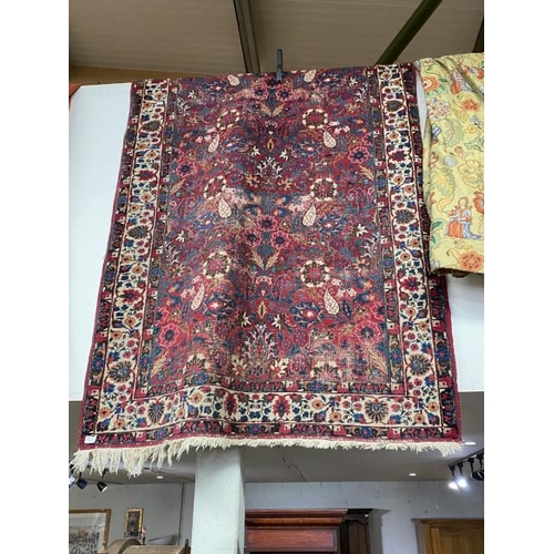 63 - Red ground Persian rug (some wear to rug) 200 x 134cm