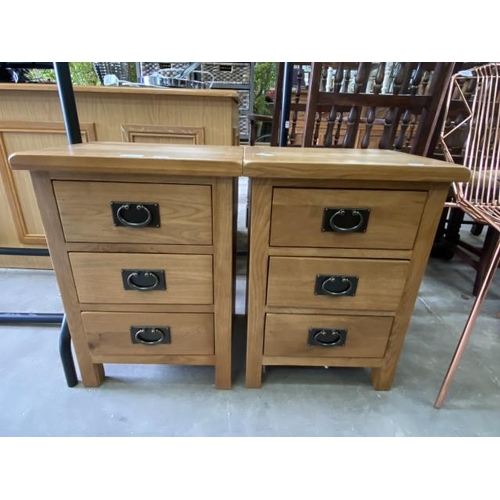 209 - 2 solid oak 3 drawer bedside chests 58H 35W 42D