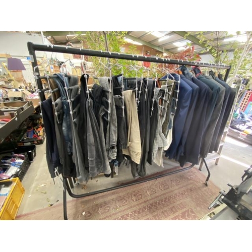 258 - Rail of men's trousers sizes 32, 34 and 36 including dress trousers, jeans, cargo pants etc, 2 suits... 