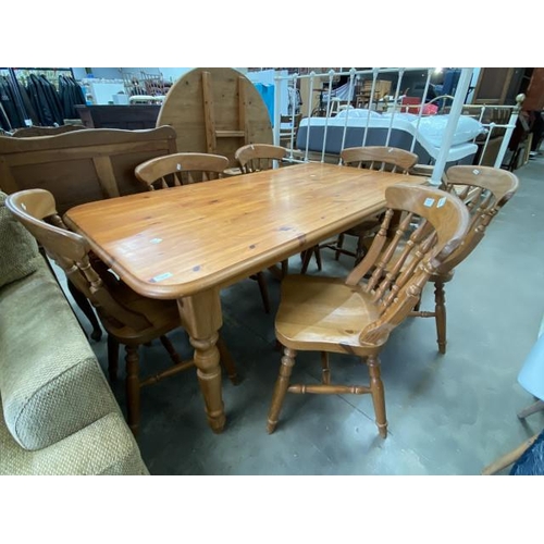 50 - Pine farmhouse table 75H 163W 86D and 6 spindle back chairs