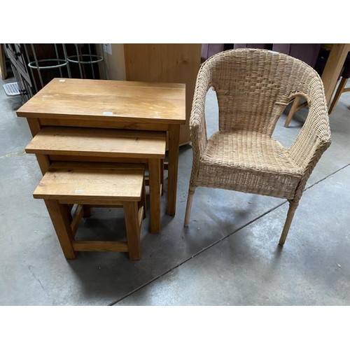 59 - Wicker bedroom chair 56W and a solid oak nest of 3 tables 60H 70W 42D