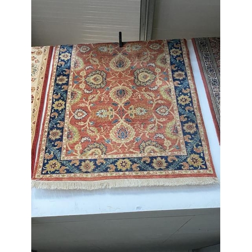 68 - Kashmir terracotta ground rug 121 x 187cm