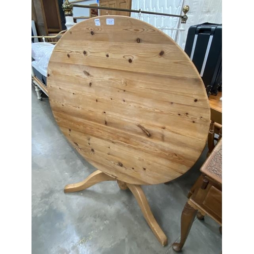 72 - Pine tilt top pedestal table 74H 103cm diameter