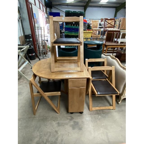 113 - Rubber wood space saving table and 4 chairs 75H 33-138W 87D