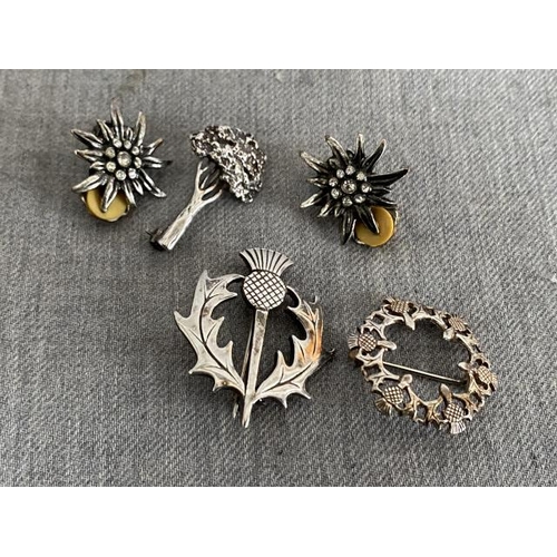 262 - 3 silver brooches & a pair of silver tone sunburst clip earrings