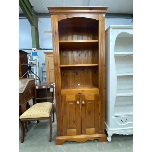 33 - Pine bookcase with 2 door cupboard to the underneath 196H 78W 33D