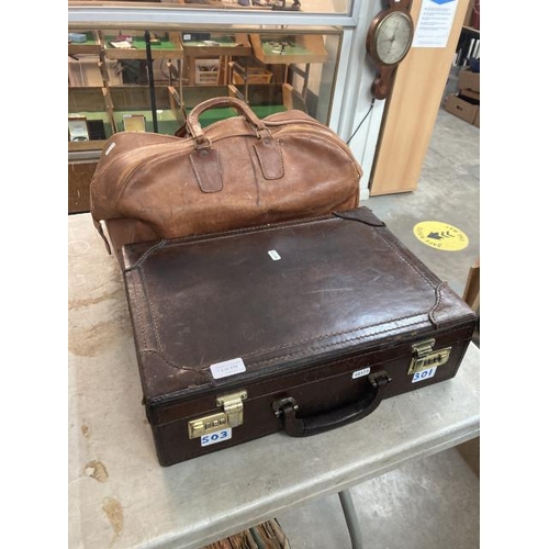 339 - Vintage brown leather combination lock briefcase & tan leather travel bag (lock code 301 & 503)