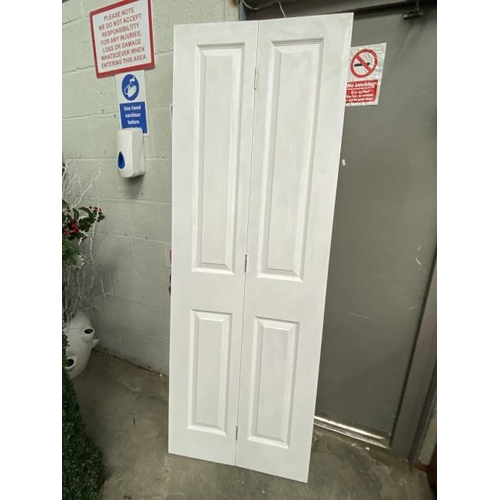 41 - 2 folding panelled doors (each door 196H 34W)