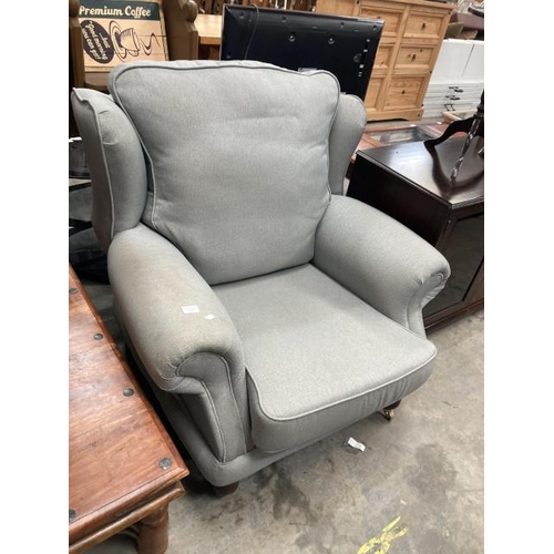 443 - Grey linen effect upholstered wing armchair 100W