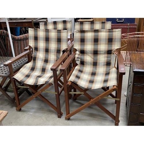 52 - 4 folding teak framed garden directors chairs 57W & a folding garden table 50H 50W 50D