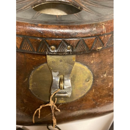 204 - Pot Bellied Leather Creel with embossed lid with brass fittings & leather strap, 32.5cm wide 18cm hi... 