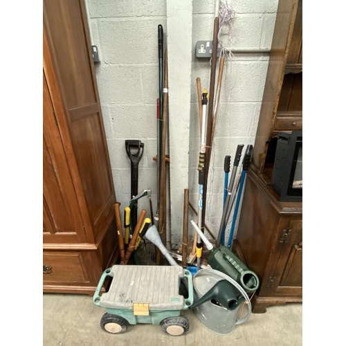 107 - Assorted gardening tools, galvanised watering can, storage trolley etc