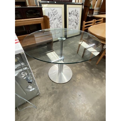 113 - Contemporary glass topped centre table with a chrome base 74H 100cm diameter