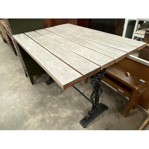 146 - Victorian cast iron based garden table with teak plank top 77H 110W 78D