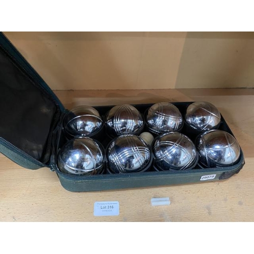 316 - Cased boules set