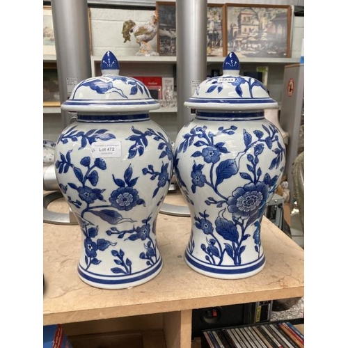 472 - Pair of blue & white vases with covers 36H