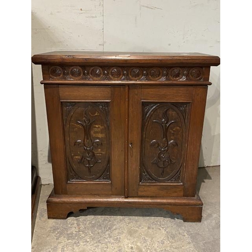 61 - Victorian carved mahogany 2 door cupboard 64H 67W 25D