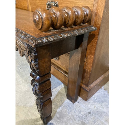 53 - Victorian carved oak hall bench with original turned scroll armrests 56H 120W 28D