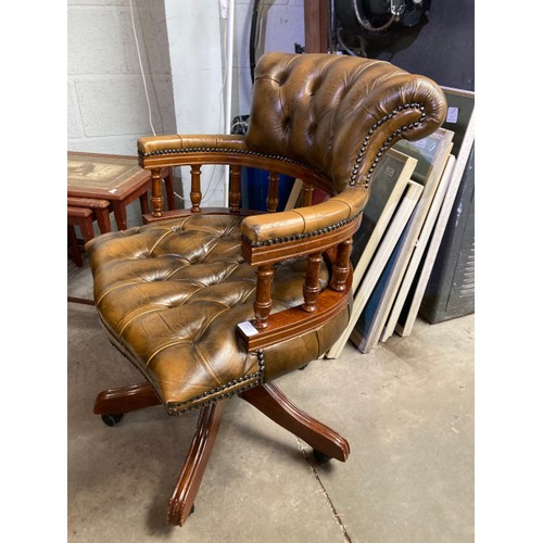 30 - Brown leather button back Chesterfield Captain’s swivel chair 62W