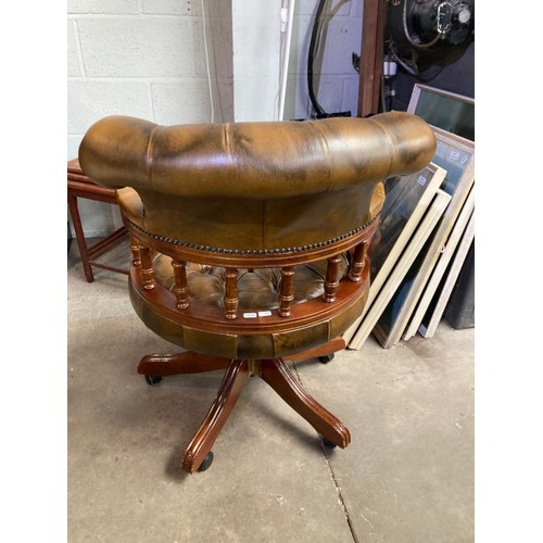 30 - Brown leather button back Chesterfield Captain’s swivel chair 62W