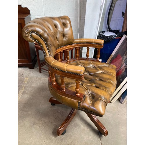 30 - Brown leather button back Chesterfield Captain’s swivel chair 62W