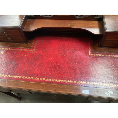 24 - Edwardian mahogany writing desk with red leather inset 94H 115W 54D