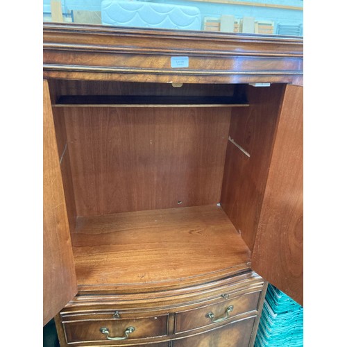 98 - NG Bailey & Co Ltd mahogany cocktail cabinet with brush slide and two keys 154H 73W 47D