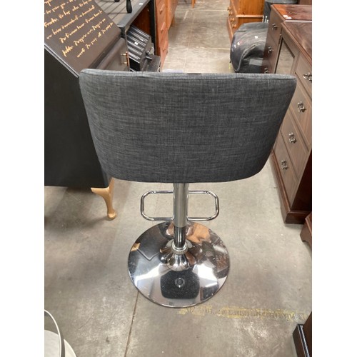 116 - 2 contemporary chrome based swivel bar stools upholstered in grey linen fabric 106H 52W 46D